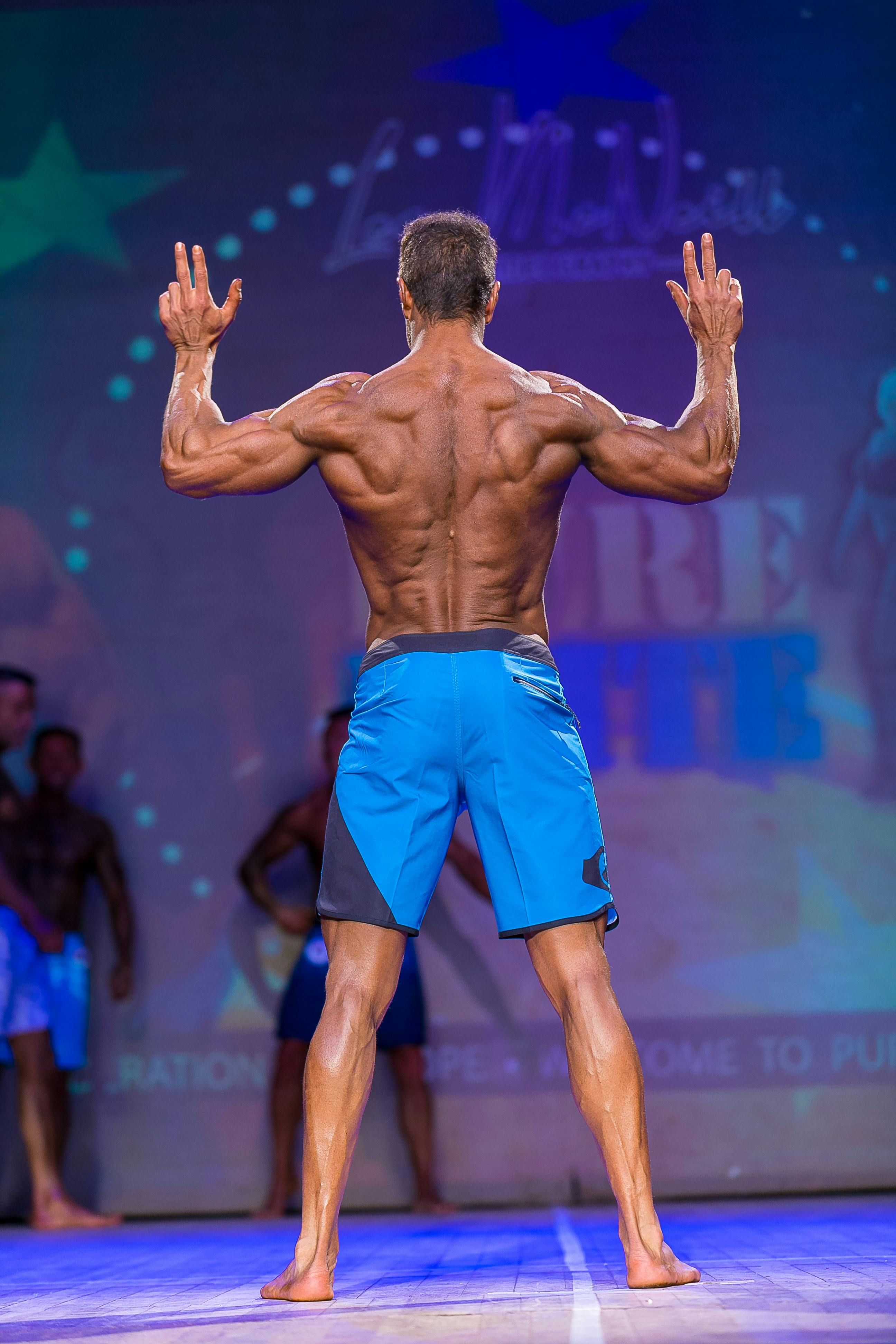 Kishore Naib men's physique back double bicep